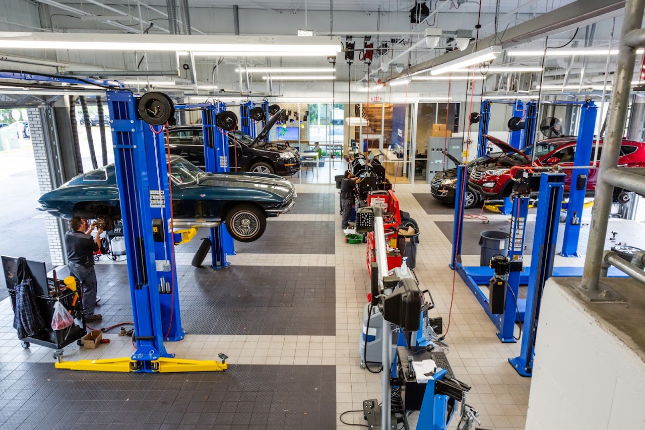 Honest-1 pristine repair workshop with hydraulic lifts